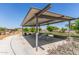 Image of a shaded park with a concrete patio area for picnics at 5752 N 109Th Ave, Phoenix, AZ 85037