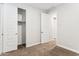 Bedroom boasts ample closet space, neutral walls, and easy access to the hallway at 5828 E Covey Ln, Phoenix, AZ 85054