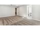 Spacious bedroom with neutral carpet, an open doorway, and a view of the home's interior at 5828 E Covey Ln, Phoenix, AZ 85054