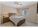 Inviting bedroom with a plush bed, side tables, and soft lighting for a restful ambiance at 644 E Las Puertas Ln, Queen Creek, AZ 85140