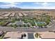 A community center and pool with well-maintained landscaping, tennis courts, and ample parking at 644 E Las Puertas Ln, Queen Creek, AZ 85140