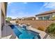 Outdoor space featuring a pool, spa, and captivating fire features creating a warm ambiance at 644 E Las Puertas Ln, Queen Creek, AZ 85140