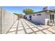 Spacious backyard featuring concrete pavers, gravel accents and block wall at 6728 N 24Th Dr, Phoenix, AZ 85015