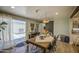Charming dining room with a view to the patio, perfect for entertaining guests at 6728 N 24Th Dr, Phoenix, AZ 85015