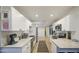 Bright kitchen with white cabinets, granite countertops, and stainless steel appliances at 6728 N 24Th Dr, Phoenix, AZ 85015