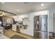 Updated kitchen features stainless appliances and an open layout at 6728 N 24Th Dr, Phoenix, AZ 85015