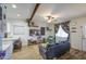 Open-concept living area showcasing modern decor and a seamless transition to the kitchen and dining spaces at 6728 N 24Th Dr, Phoenix, AZ 85015