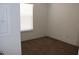 Inviting bedroom with carpet, neutral paint, and a bright window at 7807 E Main St # H7, Mesa, AZ 85207