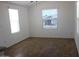 Bright living room with large windows, neutral paint, and tile flooring at 7807 E Main St # H7, Mesa, AZ 85207