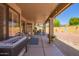 Inviting covered patio with comfortable seating, perfect for outdoor relaxation and entertaining at 9234 W Sierra Pinta Dr, Peoria, AZ 85382