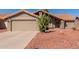 Beautiful single-story home with a low-maintenance landscape and two car garage at 9234 W Sierra Pinta Dr, Peoria, AZ 85382
