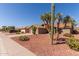 Charming home with mature desert landscaping and a well-maintained red rock front yard at 9234 W Sierra Pinta Dr, Peoria, AZ 85382