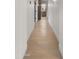 Hallway featuring wood floors and a view of the bath area at 10025 E Larkspur Dr, Scottsdale, AZ 85260