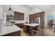 Well-designed kitchen featuring a large island, stainless appliances, and custom cabinets for storage at 10025 E Larkspur Dr, Scottsdale, AZ 85260