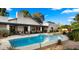 Backyard with pool features a large patio area and a built-in barbecue grill, great for entertaining at 10025 E Larkspur Dr, Scottsdale, AZ 85260