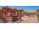 Spacious backyard featuring a patio with outdoor seating, barbecue and pergola at 102 E Angela Dr, Phoenix, AZ 85022