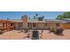 Large backyard with outdoor seating, landscaping, and shaded pergola at 102 E Angela Dr, Phoenix, AZ 85022