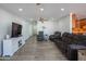 Bright living room with recessed lighting, ceiling fan, and modern flooring perfect for entertaining at 102 E Angela Dr, Phoenix, AZ 85022