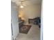 Bright bedroom with neutral colors, a ceiling fan, and comfortable seating area at 11360 E Keats Ave # 75, Mesa, AZ 85209