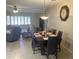 Elegant dining area featuring a wooden table with seating for six, perfect for Gathering meals at 11360 E Keats Ave # 75, Mesa, AZ 85209