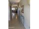 Inviting hallway with tile flooring leading to the living and dining areas at 11360 E Keats Ave # 75, Mesa, AZ 85209