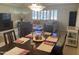 Open-concept living and dining area with a bright, airy feel, perfect for entertaining guests at 11360 E Keats Ave # 75, Mesa, AZ 85209