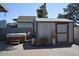 Outdoor backyard featuring a hot tub and shed, all situated on a brick-paved surface at 12601 N 34Th St, Phoenix, AZ 85032