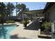 Backyard features a pool, patio, spa, and outdoor kitchen, perfect for entertaining at 12601 N 34Th St, Phoenix, AZ 85032