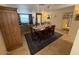 Elegant dining area with a large table, stylish chairs, and seamless flow into the living room, ideal for hosting memorable gatherings at 12601 N 34Th St, Phoenix, AZ 85032