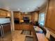 Updated kitchen with wood cabinetry, granite countertops, and stainless appliances at 12601 N 34Th St, Phoenix, AZ 85032