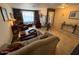 Spacious living room showcasing tile flooring, plush seating, tasteful decor, and ample natural light, creating a warm and inviting atmosphere at 12601 N 34Th St, Phoenix, AZ 85032