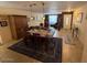 Open-concept living and dining area featuring elegant decor, abundant natural light, and a welcoming ambiance for gatherings and relaxation at 12601 N 34Th St, Phoenix, AZ 85032