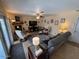 Comfortable living room featuring a cozy fireplace, plush seating, and abundant natural light, creating an inviting space for relaxation at 12601 N 34Th St, Phoenix, AZ 85032