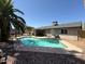 An inviting backyard pool with a mature palm tree, perfect for outdoor relaxation and enjoyment at 12601 N 34Th St, Phoenix, AZ 85032