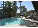 Inviting backyard pool with a hot tub, mature trees, and patio area, perfect for relaxation at 12601 N 34Th St, Phoenix, AZ 85032