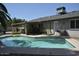 Refreshing swimming pool with a patio, surrounded by lush greenery and a modern exterior at 12601 N 34Th St, Phoenix, AZ 85032