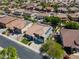 This beautiful two-story home has solar panels and is located in a quiet neighborhood with mature trees at 13323 W Rancho Dr, Litchfield Park, AZ 85340