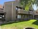 Inviting exterior of home with manicured lawn and lovely balcony at 1432 W Emerald Ave # 686, Mesa, AZ 85202