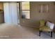 Inviting living room area, filled with natural light, opens to outdoor balcony at 1432 W Emerald Ave # 686, Mesa, AZ 85202