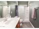 Stylish bathroom with modern fixtures, a tub-shower combination, and a contemporary design for relaxation and convenience at 152 N 194Th Ln, Buckeye, AZ 85326