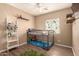Cozy bedroom features a fun bunk bed, playful decor, and plenty of natural light, perfect for  at 152 N 194Th Ln, Buckeye, AZ 85326