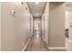 Hallway features wood-look floors leading to bedrooms and living areas at 152 N 194Th Ln, Buckeye, AZ 85326