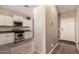 Kitchen featuring stainless steel appliances and white cabinets at 152 N 194Th Ln, Buckeye, AZ 85326