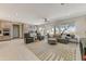 Open floor plan featuring a living room connected to the kitchen, great for entertaining and Gathering life at 15766 W Grand Point Ln, Surprise, AZ 85374