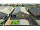 Aerial view of the home featuring block wall fencing, artifical turf and gravel landscaping at 16396 W Questa Dr, Surprise, AZ 85387