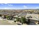 Neighborhood aerial view with mountain views showing the home's location in the community at 16396 W Questa Dr, Surprise, AZ 85387