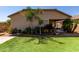 Inviting backyard with green turf and landscaping, perfect for outdoor gatherings and relaxation at 16603 N 168Th Dr, Surprise, AZ 85388