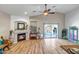 Inviting living room with a fireplace, sliding doors to the backyard, and stylish decor, ideal for comfortable living at 16924 W Stevenage St, Surprise, AZ 85374