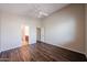 Spacious bedroom with vinyl flooring and a ceiling fan at 17050 W Manchester Dr, Surprise, AZ 85374