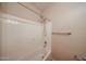 Clean white shower featuring a shower head and chrome fixture at 17050 W Manchester Dr, Surprise, AZ 85374